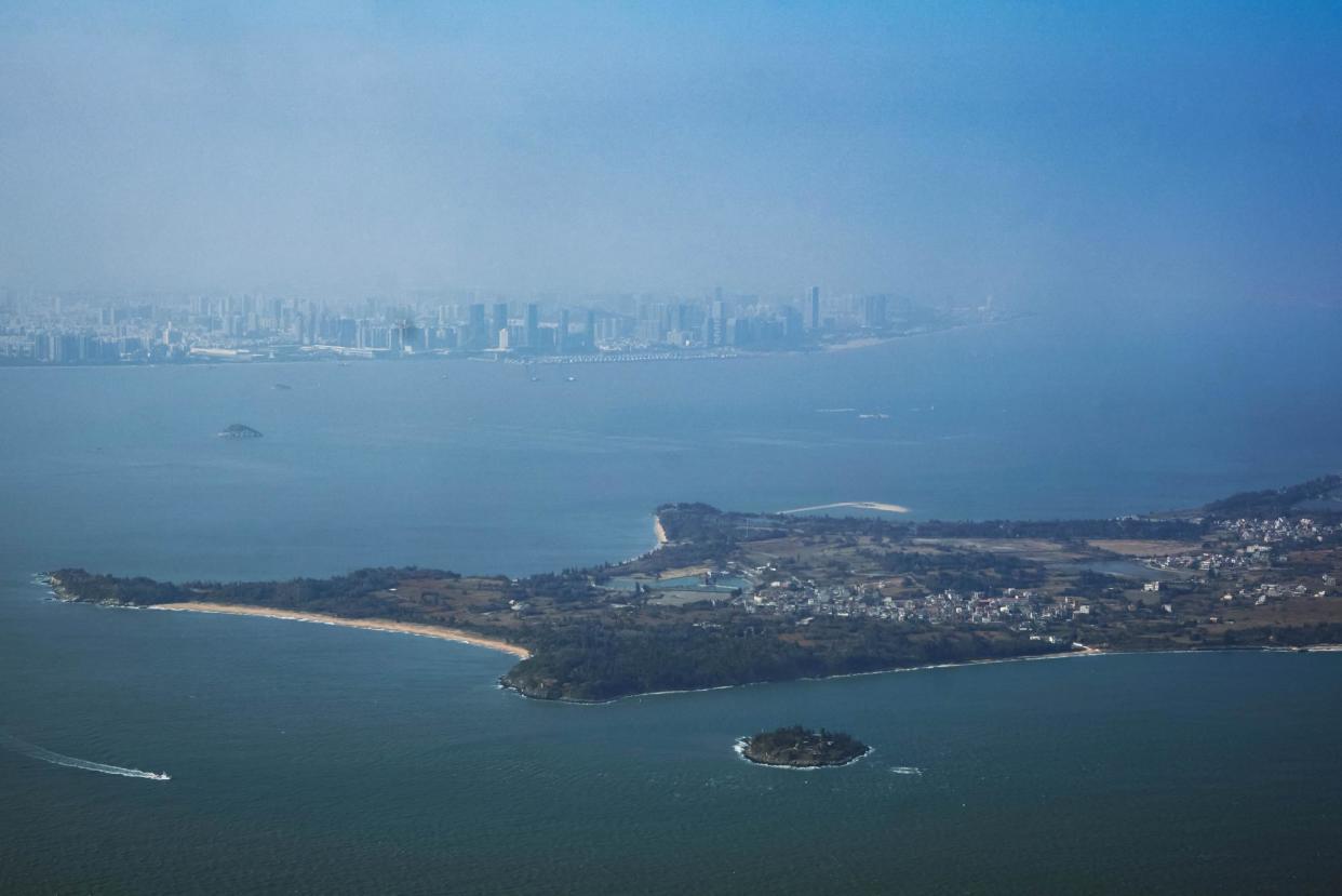 <span>A view of the Chinese city of Xiamen, in the far distance, and the islands of Kinmen in Taiwan, in the foreground. China’s coast guard boarded a Taiwanese tourist vessel near Kinmen on Monday.</span><span>Photograph: An Rong Xu/Getty Images</span>