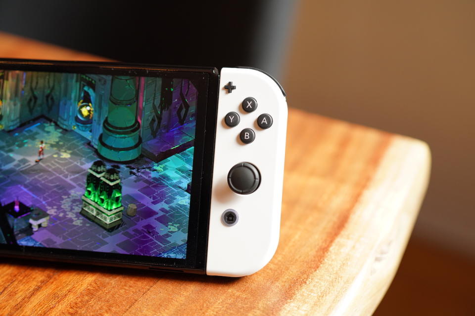 The Nintendo Switch OLED on a table.