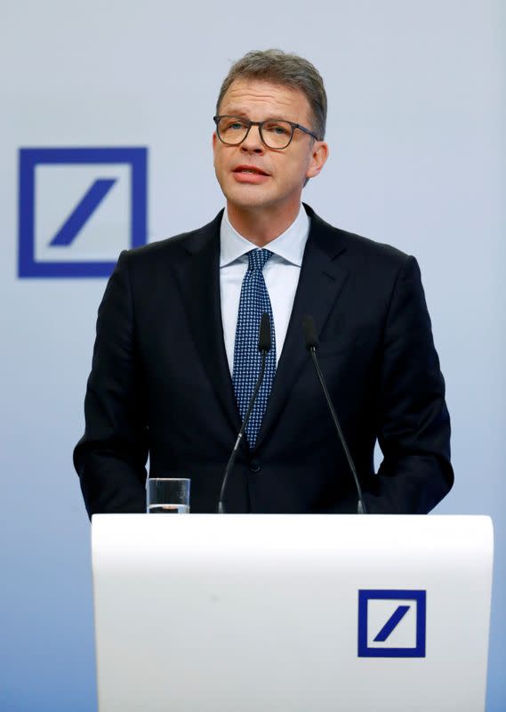 FILE PHOTO: Christian Sewing, CEO of Deutsche Bank AG, addresses the media during the bank's annual news conference in Frankfurt