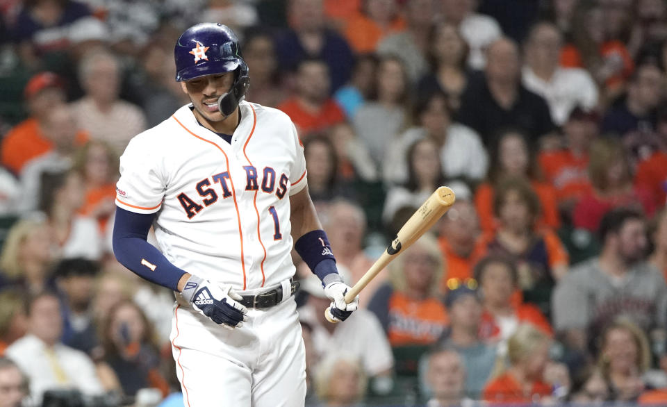 Houston Astros' Carlos Correa reacts striking out against the Detroit Tigers during the first inning of a baseball game Monday, Aug. 19, 2019, in Houston. (AP Photo/David J. Phillip)