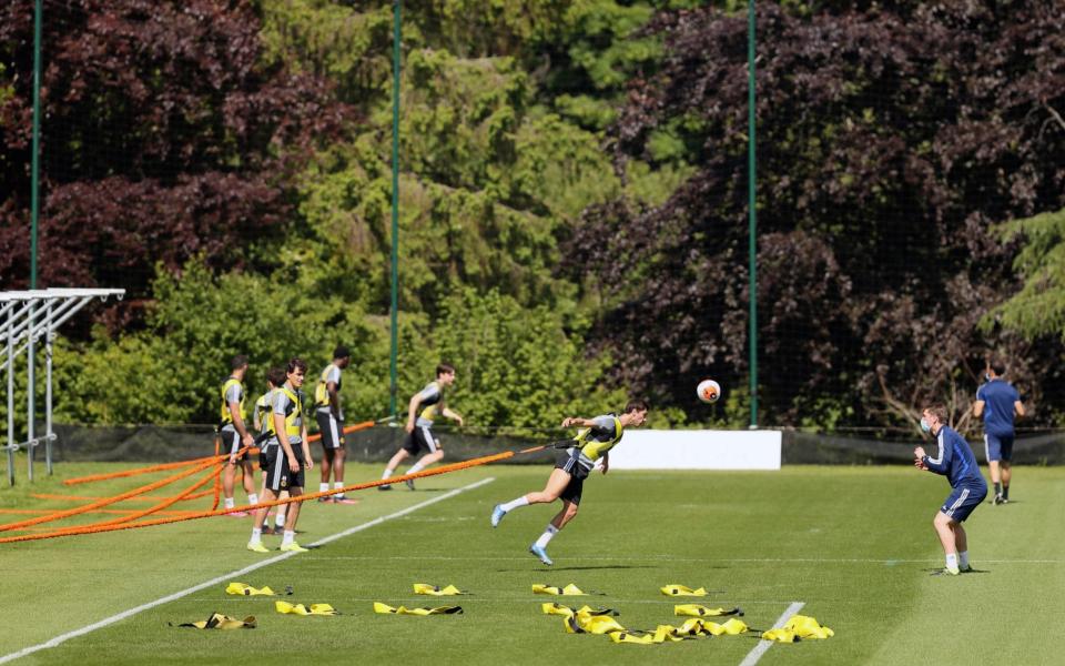 Wolverhampton Wanderers players at the training ground take part in a group isolation training session at Sir Jack Hayward Training Ground - GETTY IMAGES