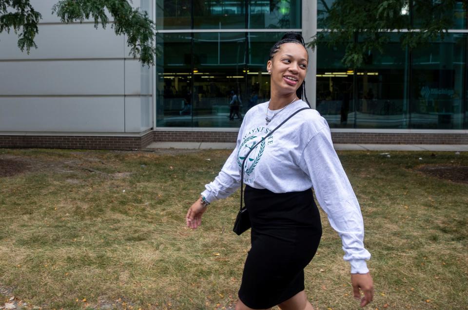 Ayanna Adams, 29, an undergraduate student at Wayne State University majoring in psychology with a law minor, walks inside the Wayne State University campus in Detroit on Wednesday, Sept. 27, 2023. Adams serves on the executive board of Wayne State's Black Student Union and is the community outreach chair; she also plans to attend law school. "I want to fight for and defend people who can't help themselves," said Adams, who wants to focus on civil, military and employment labor law in the future.
