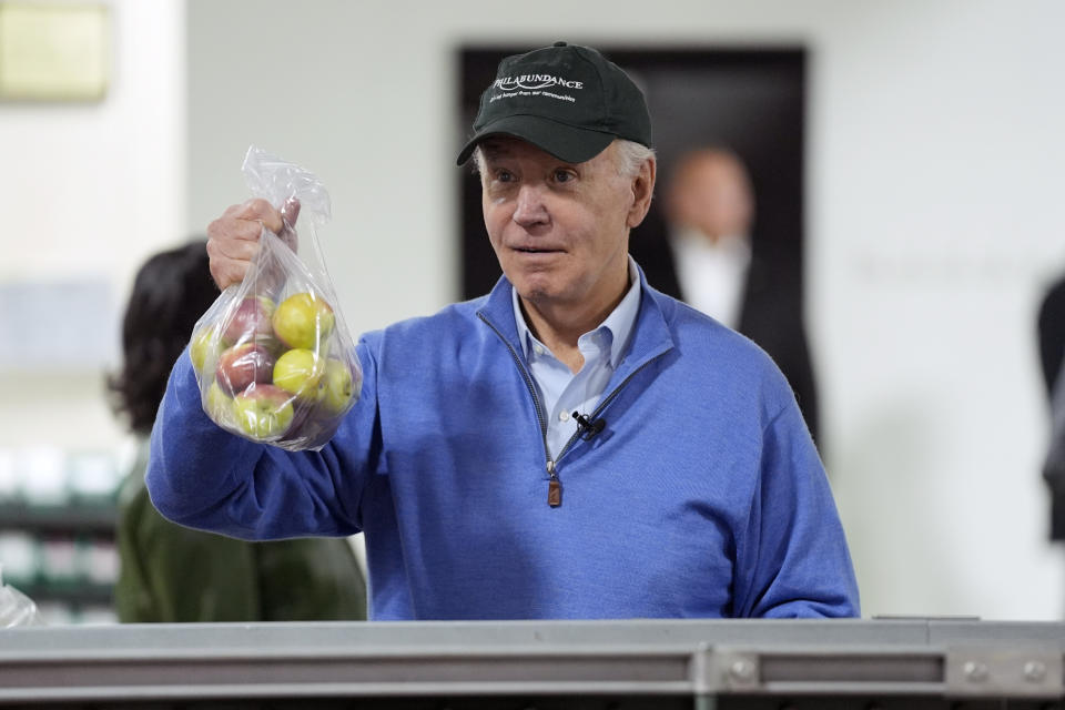 President Joe Biden volunteers at Philabundance, a hunger relief organization, to mark Martin Luther King, Jr., day, Monday, Jan. 15, 2024, in Philadelphia. (AP Photo/Evan Vucci)