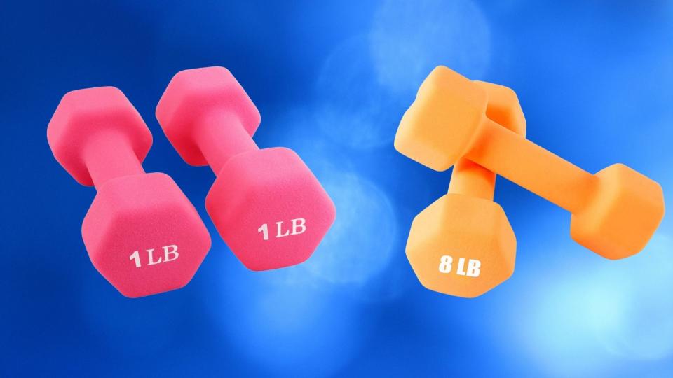 On the right, pink dumbbells with 1 pound lettering. On the left, orange with 8 pound lettering.