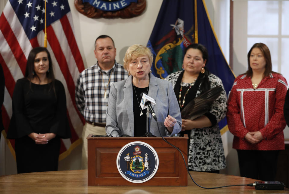 Maine Gov. Janet Mills speaks at the signing ceremony to establish Indigenous Peoples' Day, Friday, April 26, 2019, at the State House in Augusta, Maine. Several tribal leaders attended the event. (AP Photo/Robert F. Bukaty)