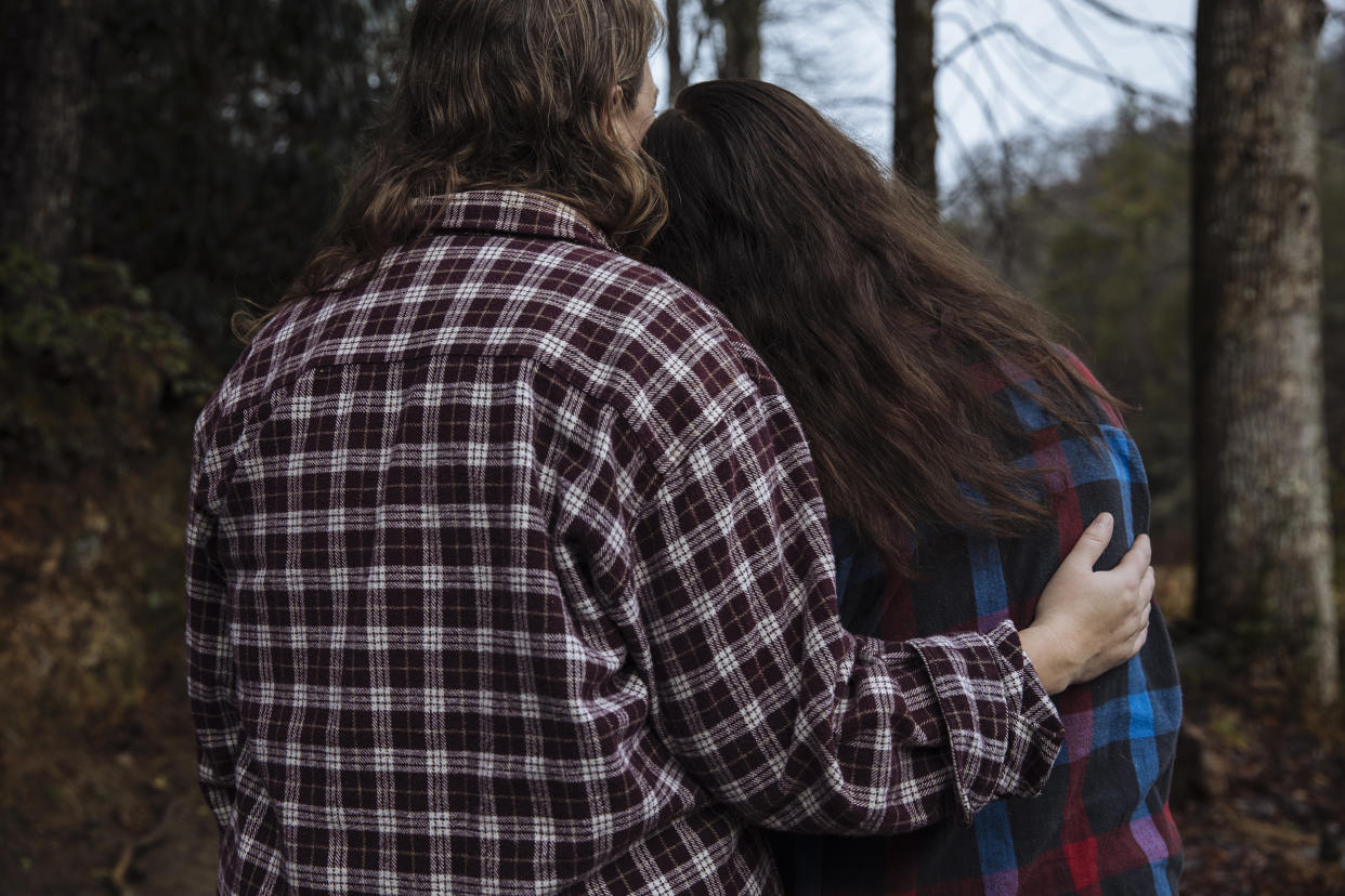 Marcella and her daughter Riley, 15, at their home in Cherokee County, N.C., on Dec. 4, 2022. Riley was sexually assaulted and later harassed by her fellow students at Andrews Middle School in Andrews, N.C. (Kendrick Brinson for NBC News)