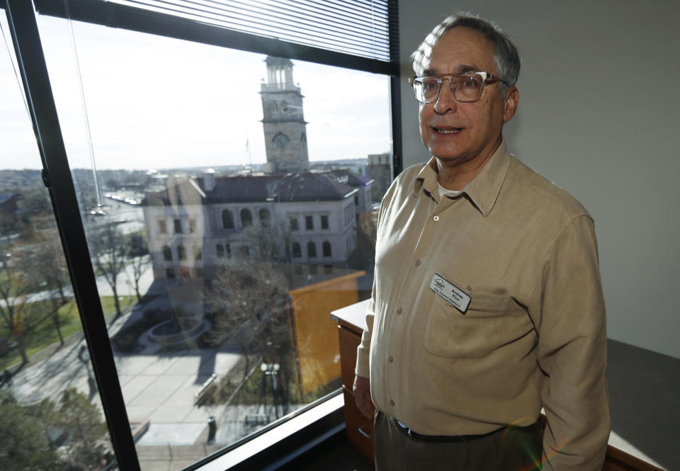 In this Dec. 13, 2019, photograph, Colorado Springs, Colo., Andres Pico, a member of the city council, is shown in a city office in Colorado Springs, Colo. Hispanic voters are heavily Democratic but Hispanic men are more likely to vote Republican than Hispanic women. This gender gap is roughly the same size as the one among white voters. Pico and Yolanda Avila are friends who sit next to each other on the Colorado Springs' city council. But politically the two couldn't be further apart, Avila is a durable Democrat and Pico an unflinching Republican. (AP Photo/David Zalubowski)