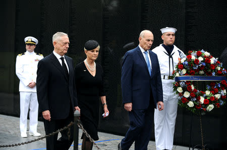 U.S. Secretary of Defence James Mattis, General John Kelly, White House Chief of Staff and Cindy McCain, wife of late Senator John McCain, arrive to lay a ceremonial wreath honouring all whose lives were lost during the Vietnam War at the Vietnam Veterans Memorial in Washington, U.S., September 1, 2018. REUTERS/Mary F. Calvert