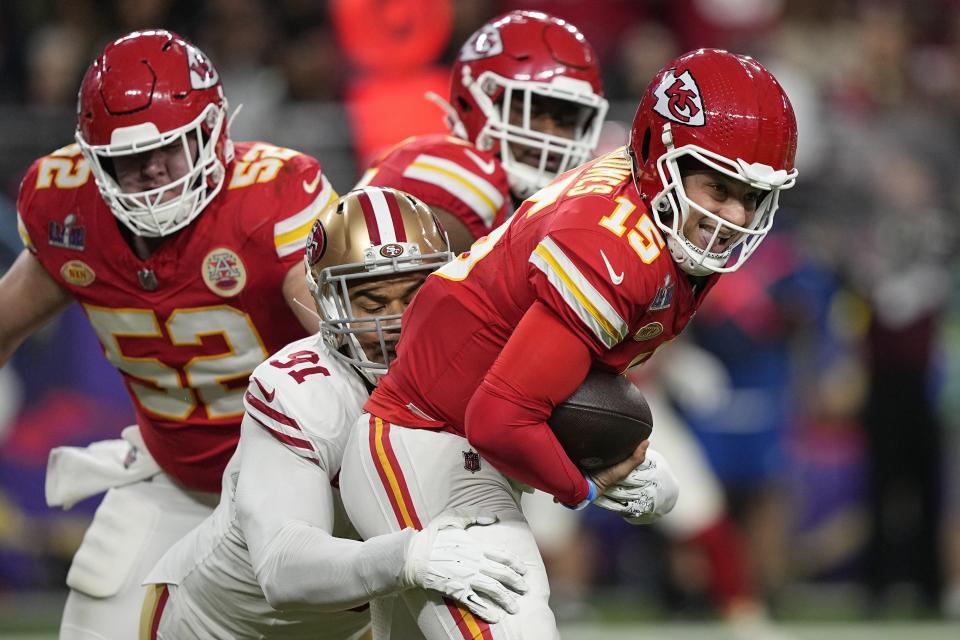 Kansas City Chiefs quarterback Patrick Mahomes (15) is sacked by San Francisco 49ers defensive end Arik Armstead (91) during the first half of the NFL Super Bowl 58 football game Sunday, Feb. 11, 2024, in Las Vegas. (AP Photo/Brynn Anderson)