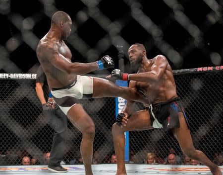 Apr 23, 2016; Las Vegas, NV, USA; Jon Jones (red gloves) competes against Ovince Saint Preux (blue gloves) during UFC 197 at MGM Grand Garden Arena. Mandatory Credit: Joshua Dahl-USA TODAY Sports