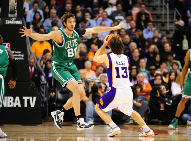 Boston Celtics players' retired number banners hang from rafters at News  Photo - Getty Images