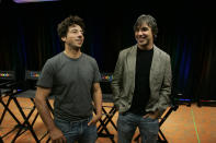 FILE - In this Sept. 2, 2008, file photo Google co-founders Sergey Brin, left, and Larry Page talk about the new Google Browser, "Chrome," during a news conference at Google Inc. headquarters in Mountain View, Calif. Page and Brin are stepping down from their roles within the parent company, Alphabet. Page, who had been serving as CEO of Alphabet, and Brin, who had been president of Alphabet, will remain on the board of the company. (AP Photo/Paul Sakuma, File)