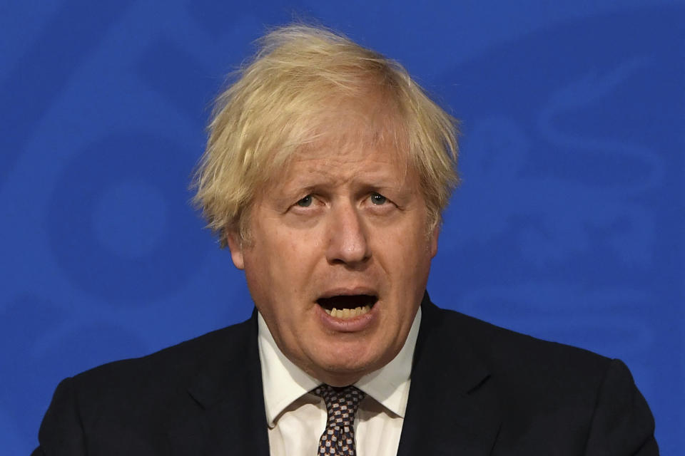 Britain's Prime Minister Boris Johnson speaks during a media briefing on coronavirus in Downing Street, London, Monday, July 5, 2021. Johnson on Monday confirmed plans to lift mask requirements and social distancing rules as planned on July 19 despite a surge in infections. (Daniel Leal-Olivas/Pool Photo via AP)