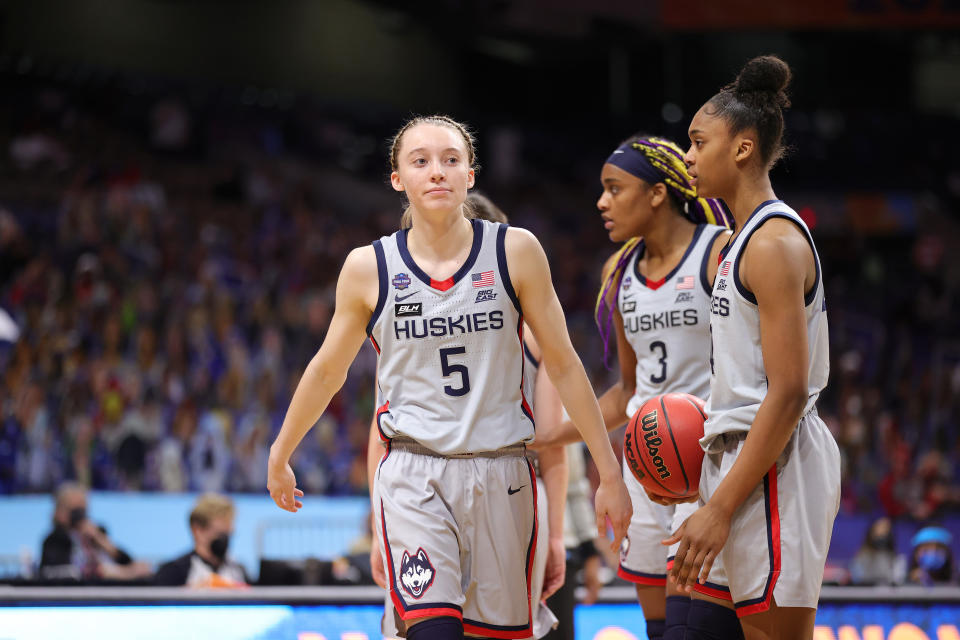 UConn's Paige Bueckers (left) reacts during her team's loss to the Arizona Wildcats in the Final Four of the 2021 NCAA women's basketball tournament on April 02. (Carmen Mandato/Getty Images)