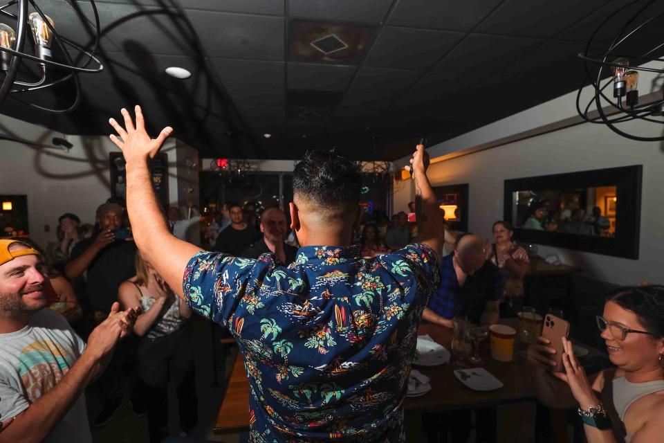 Delaware chef Reuben Dhanawade gives remarks to the audience after watching an episode of Food Network's "Chopped" in which Dhanawade is a contestant during a watch party Monday, May 31, 2022, at Piccolina Toscana in Wilmington.