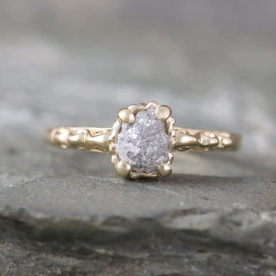 <i>Buy it from&nbsp;<a href="https://www.etsy.com/listing/181563317/14k-yellow-gold-raw-diamond-engagement?ref=shop_home_active_63" target="_blank">ASecondTime via Etsy</a>&nbsp;for&nbsp;$795</i>