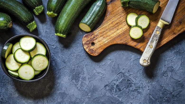 Raw cut zucchini on cutting board 
