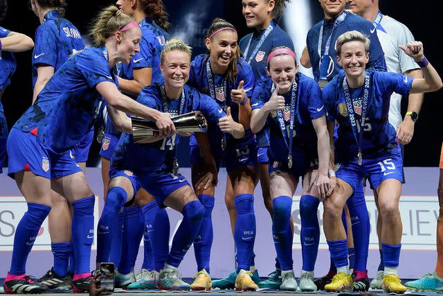 <p>Sam Hodde/Getty</p> Becky Sauerbrunn #4, Emily Sonnett #14, Alex Morgan #13, Rose Lavelle #16 and Megan Rapinoe #15 of the United States celebrate after defeating Brazil in the 2023 SheBelieves Cup match at Toyota Stadium on February 22, 2023 in Frisco, Texas