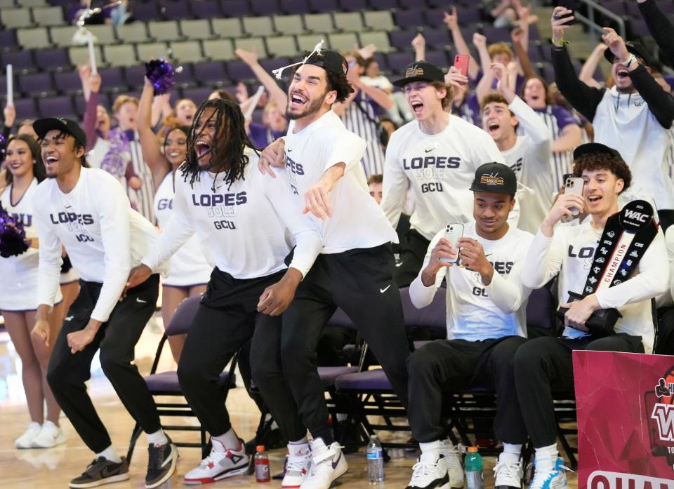 Grand Canyon University players react to their bracket seeding during an NCAA Selection Show watch party at GCU Arena in Phoenix on March 12, 2023.