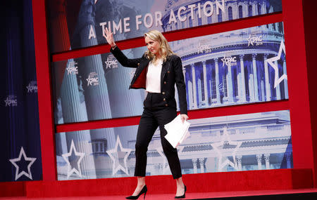 Marion Marechal-Le Pen, niece of right-wing populist French politician Marine Le Pen, waves after speaking at the Conservative Political Action Conference (CPAC) at National Harbor, Maryland, U.S., February 22, 2018. REUTERS/Kevin Lamarque