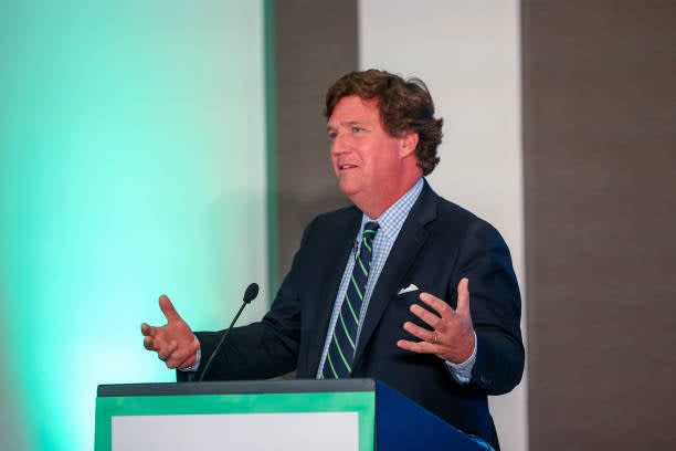 Tucker Carlson speaks during RiskOn360! GlobalSuccess Conference at Ahern Hotel and Convention Center on 20 November 2023 in Las Vegas (Getty Images)
