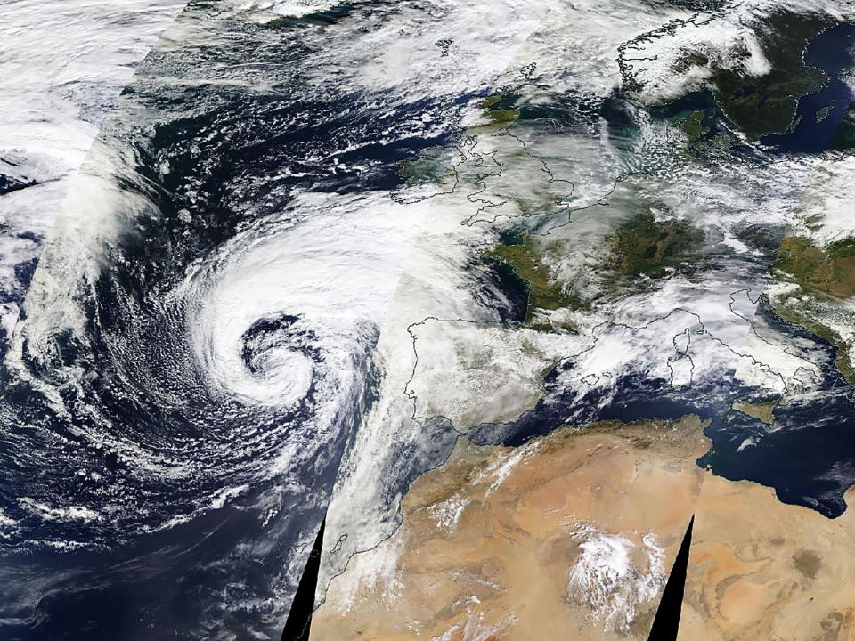 Satellite image shows Storm Babet approaching Europe, October 16, 2023. Photo released October 17, 2023. See SWNS story SWNAbabet. Incredible satellite imagery shows Storm Babet as UK and Ireland braces for its arrival. The view from space showed the storm on Monday (16 Oct) as it made its way steadily near Spain and Portugal, before being forecast to turn northwards towards the UK. Babet is predicted brings bands of heavy rain and strong winds from midweek, with MET Office warnings issued. The incredible God's eye view was made possible by NASA's Earth Observing System Data and Information System (EOSDIS). The satellite imagery is available within three hours of observation - essentially showing the entire Earth as it looks 