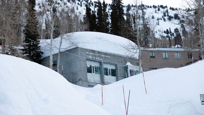 The Alta town office is seen surrounded by snow on April 9. The nearby Alta Ski Area received another 7 inches of snow by Tuesday morning, pushing its seasonal total to a record 903 inches.