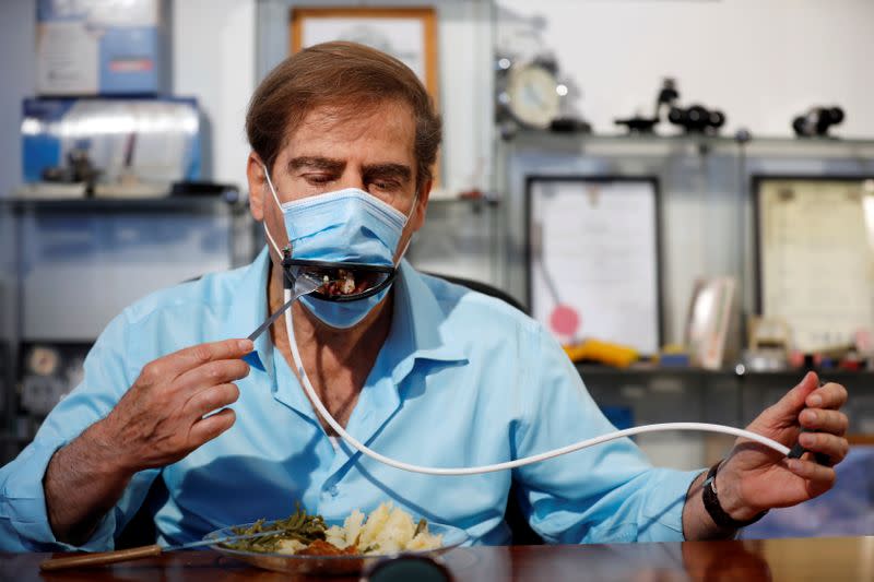 Israeli inventors develop a mask that allows diners to eat food without taking it off in Or Yehuda