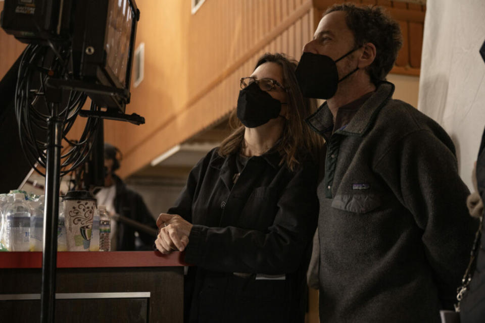 Writer/producer Tricia Cooke and director/writer/producer Ethan Coen on the set of Drive-Away Dolls, a Focus Features release (Image: Wilson Webb/Working Title/Focus Features)