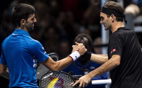 Novak Djokovic and Roger Federer - Roger Federer dumps Novak Djokovic out of ATP Finals with crushing victory - Credit: GETTY IMAGES