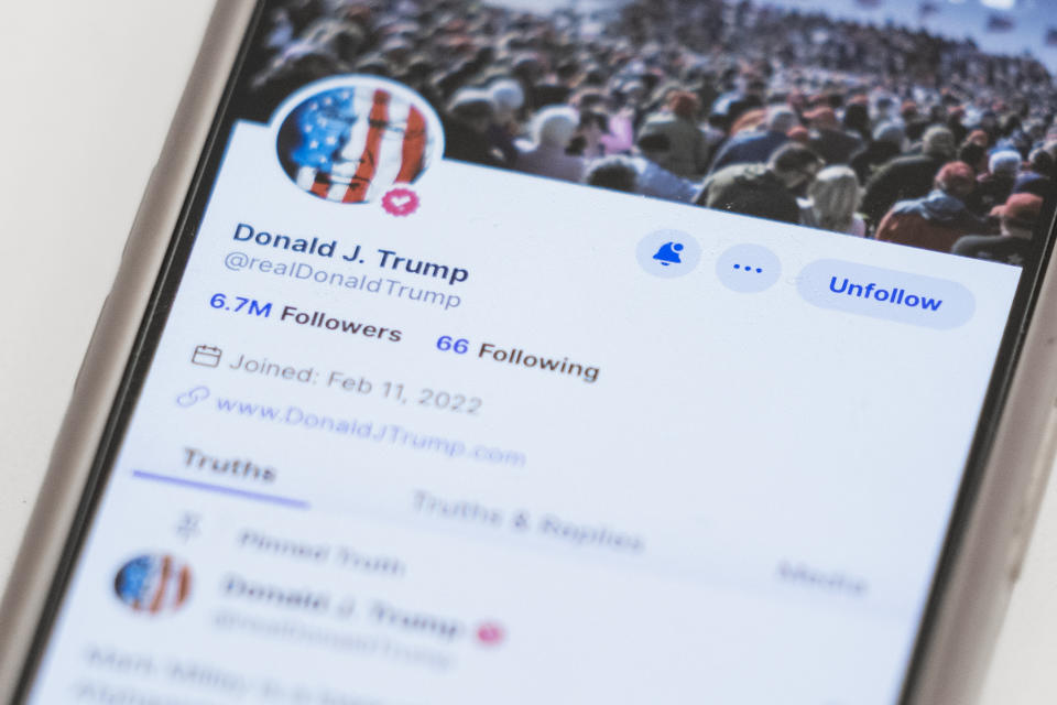 FILE - The Truth Social account for former President Donald Trump is seen on a mobile device, Wednesday, March 20, 2024, in New York. (AP Photo/John Minchillo, File)