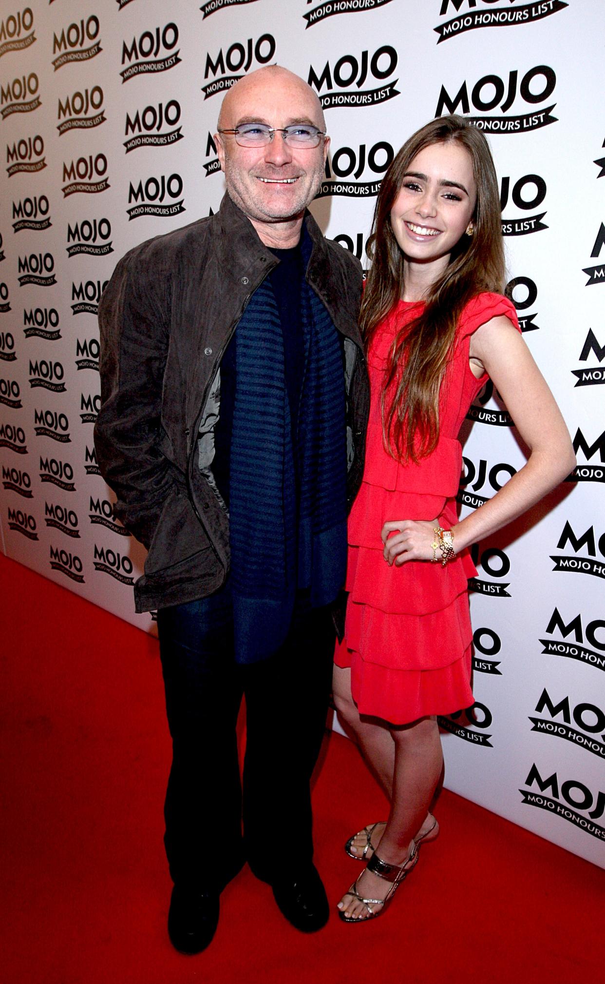 Phil Collins and daughter Lily arrive for the Mojo Honours List award ceremony at The Brewery, east London.