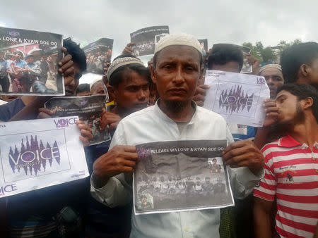 Rohingya Regugee Abdu Shakur, father of one of the victims of Inn Din massacre protests the sentencing of Reuters journalists Wa Lone and Kyaw Soe Oo at Teng Khali camp outside Cox's Bazar in Bangladesh September 5, 2018. REUTERS/Poppy McPherson