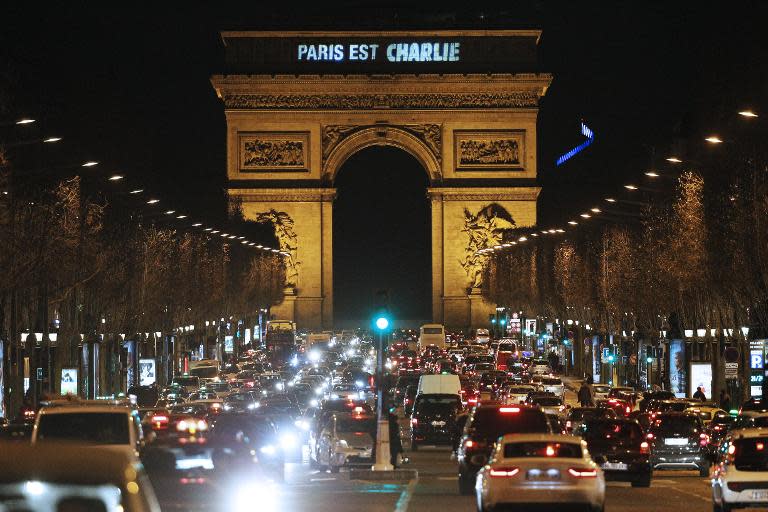 "Paris est Charlie" (Paris is Charlie) is projected onto the Arc de Triomphe in Paris, on January 9, 2015, to pay tribute to the victims of a deadly attack on the Paris headquarters of French satirical weekly Charlie Hebdo