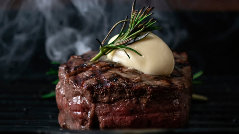 herb and butter topped filet mignon