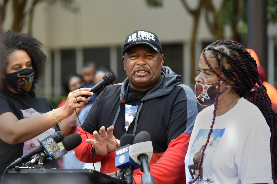 FILE - Anton Black's family members, from left, LaToya Holley, Antone Black, father, and Jenal Black, mother, speak during a press conference Thursday, Sept. 30, 2021, in Baltimore. A federal judge on Tuesday, Jan. 19, 2022, has refused to throw out a lawsuit’s claims that police on Maryland’s Eastern Shore used excessive force on Anton Black, a 19-year-old Black man who died in 2018 during a struggle with officers who handcuffed him and shackled his legs. (AP Photo/Gail Burton, File)