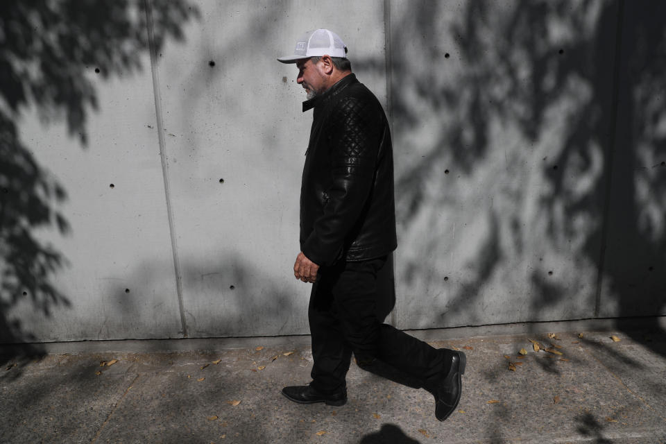 Adrian LeBaron, who lost relatives and friends in a Nov. 4, 2019 ambush in northern Mexico, leaves the office of the Special Prosecutor for Organized Crime Investigation, where he met with authorities in Mexico City, Tuesday, Jan. 7, 2020. Prosecutors said Tuesday more than 40 suspects have been identified in connection with the slaughter of the nine U.S. dual-national women and children. (AP Photo/Marco Ugarte)