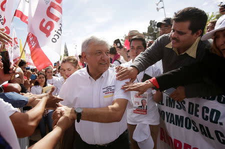 Leftist front-runner Andres Manuel Lopez Obrador of the National Regeneration Movement (MORENA) greets to supporters during his campaign rally in Ciudad Juarez, Mexico April 1, 2018. REUTERS/Jose Luis Gonzalez