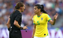 Referee Marie-Soleil Beaudoin talks to Thaisa of Brazil during the 2019 FIFA Women's World Cup France Round Of 16 match between France and Brazil at Stade Oceane on June 23, 2019 in Le Havre, France. (Photo by Alex Grimm/Getty Images)