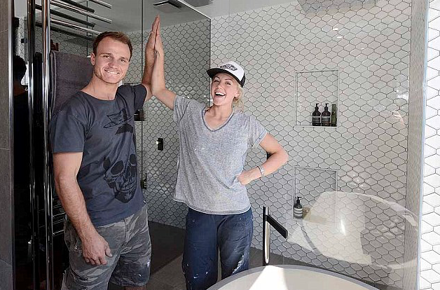 Kyal and Kara on The Block back in 2014, after receiving a 10/10 for their bathroom renovation. Source: Nine