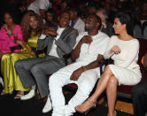 <p>Kim Kardashian keeps it causal alongside Jay Z, Kanye West, and Bey during the 2012 BET Awards.</p>