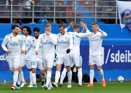 Soccer Football - La Liga Santander - Eibar vs Real Madrid - Ipurua, Eibar, Spain - March 10, 2018 Real Madrid’s Cristiano Ronaldo celebrates scoring their first goal with team mates REUTERS/Vincent West