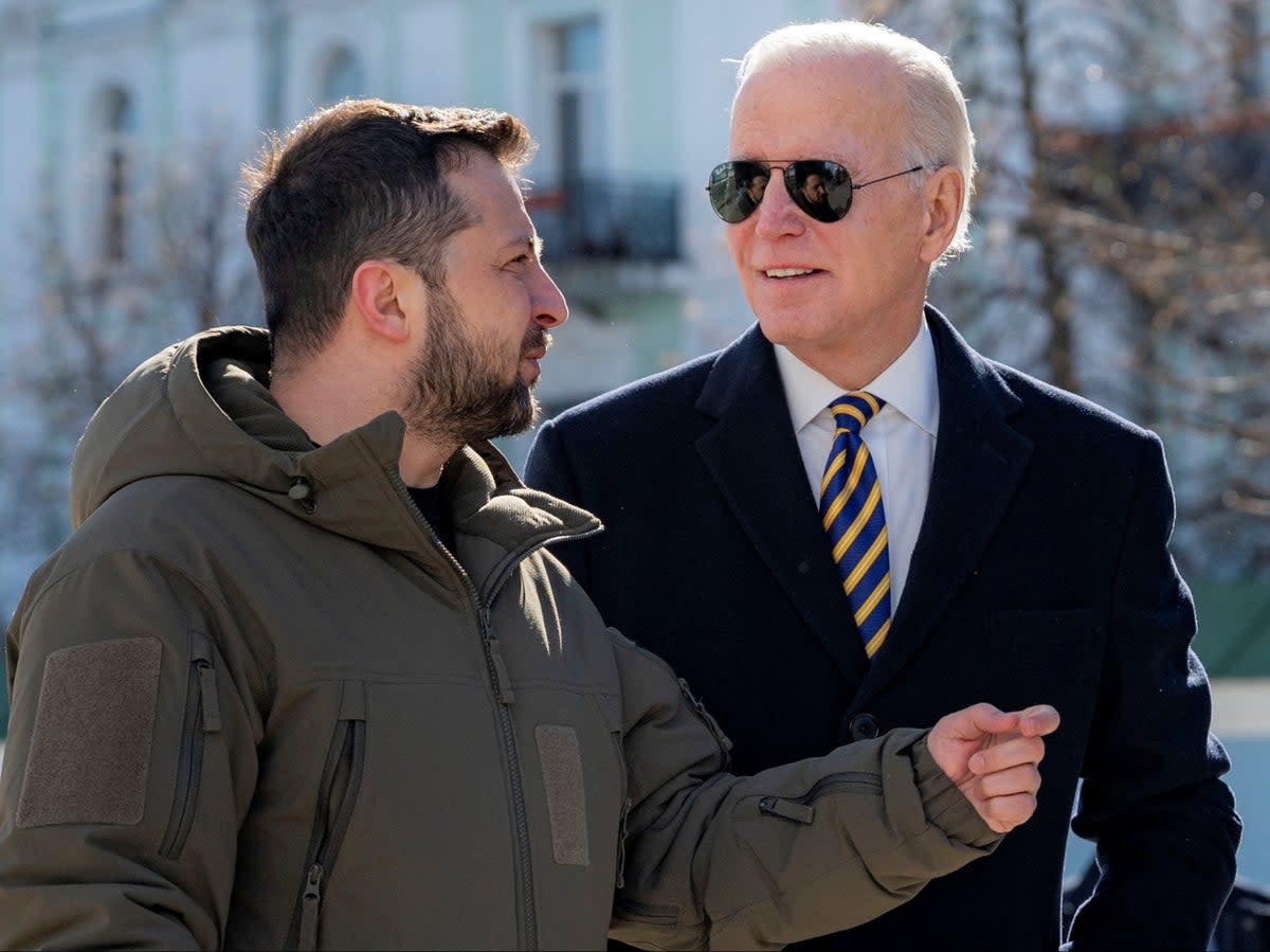 Volodymyr Zelensky with US president Joe Biden at St Michael’s monastery in Kyiv  (via Reuters)