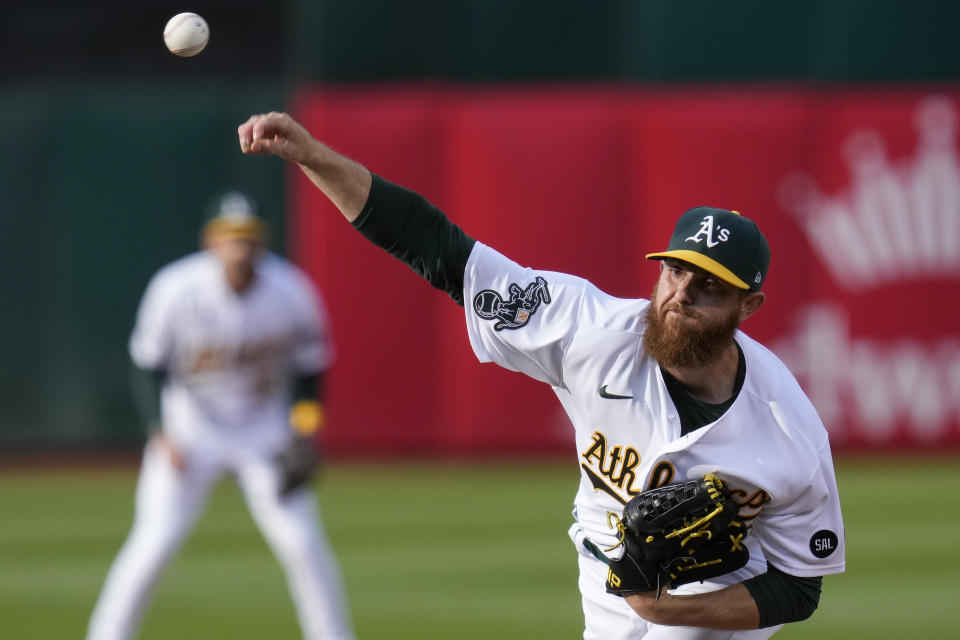 Oakland Athletics pitcher Paul Blackburn throws to a New York Yankees batter during the first inning of a baseball game in Oakland, Calif., Tuesday, June 27, 2023. (AP Photo/Godofredo A. Vásquez)
