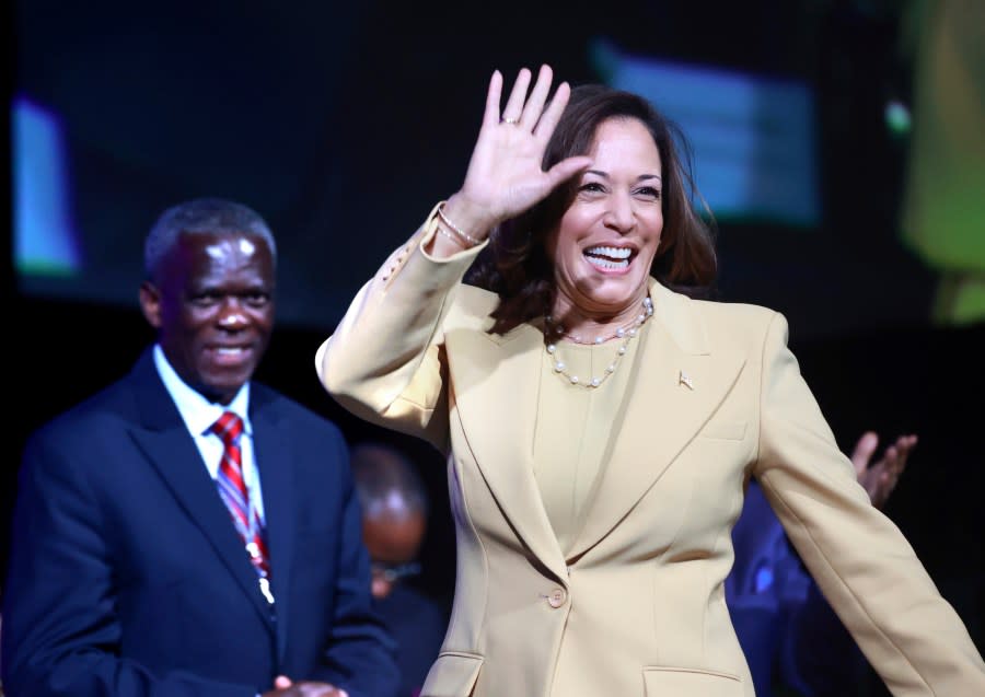 Vice President Kamala Harris takes the stage at the 20th Quadrennial Convention of the Women’s Missionary Society of the African Methodist Episcopal (AME) Church, Tuesday, Aug. 1, 2023, in Orlando, Fla. The gathering at the Orange County Convention Center is hosting 3,000 delegates from 39 countries. (Joe Burbank/Orlando Sentinel via AP)