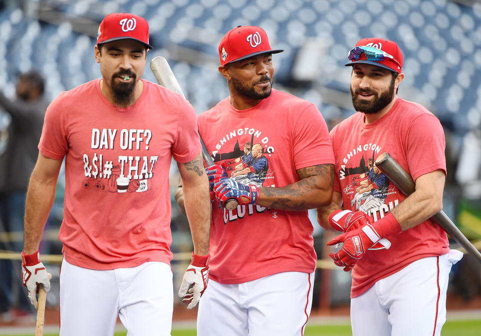 (From left to right) Washington's Anthony Rendon, Howie Kendrick and Adam Eaton warm up Friday at Nationals Park. (Getty)