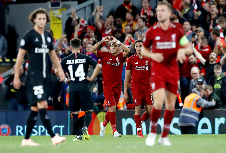 Liverpool’s Roberto Firmino celebrates scoring his side’s third goal of the game