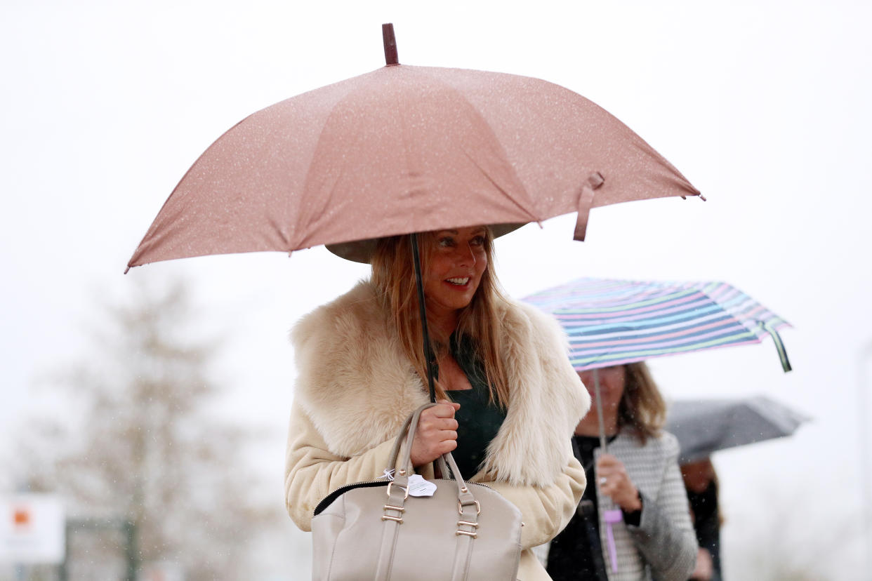 Carol Vorderman (centre) arrives for Champion Day of the 2019 Cheltenham Festival at Cheltenham Racecourse. (Photo by Andrew Matthews/PA Images via Getty Images)