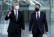 NATO Secretary General Jens Stoltenberg, left, speaks with United States Secretary of State Antony Blinken prior to a meeting at NATO headquarters in Brussels, Wednesday, April 14, 2021. United States Secretary of State Antony Blinken is in Brussels on Wednesday for talks with European and NATO allies about Afghanistan, Ukraine and other matters. (Kenzo Tribouillard, Pool via AP)