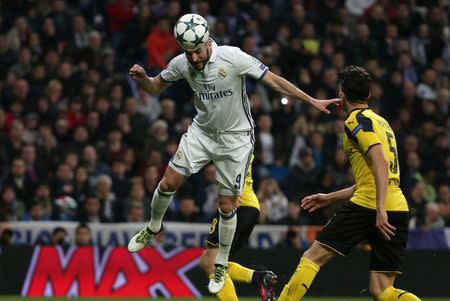 Football Soccer - Real Madrid v Borussia Dortmund - UEFA Champions League - Santiago Bernabeu stadium, Madrid, Spain - 7/12/16 Real Madrid's Karim Benzema scores during the match. REUTERS/Juan Medina